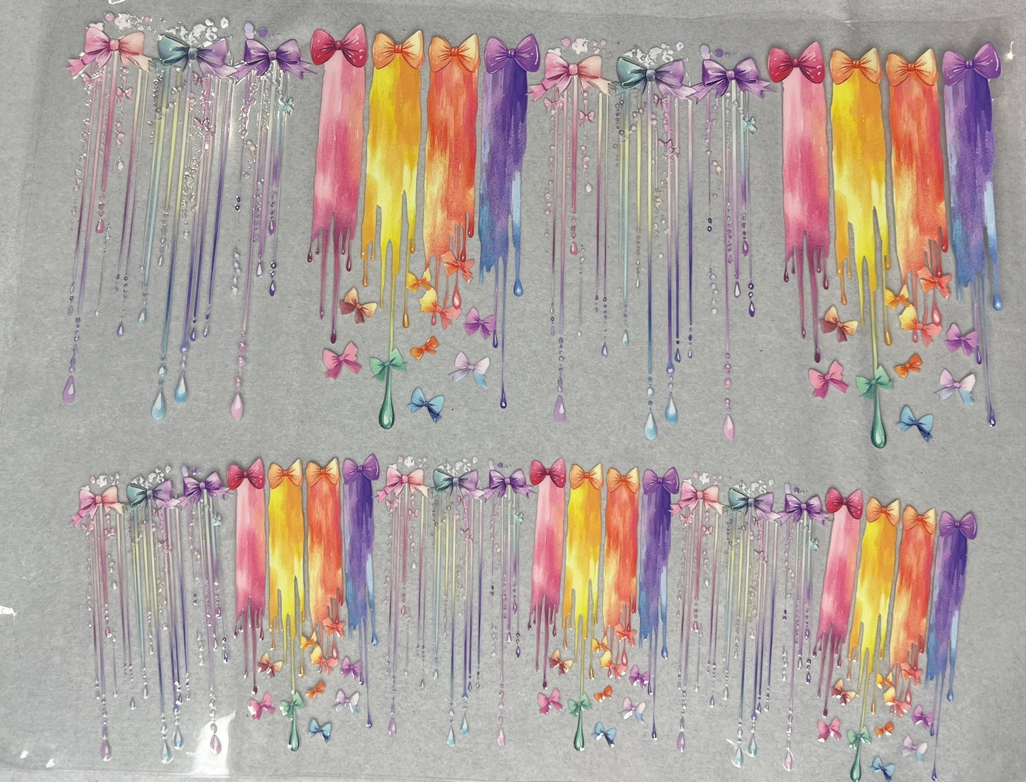 Bows with rainbow drips- 40oz